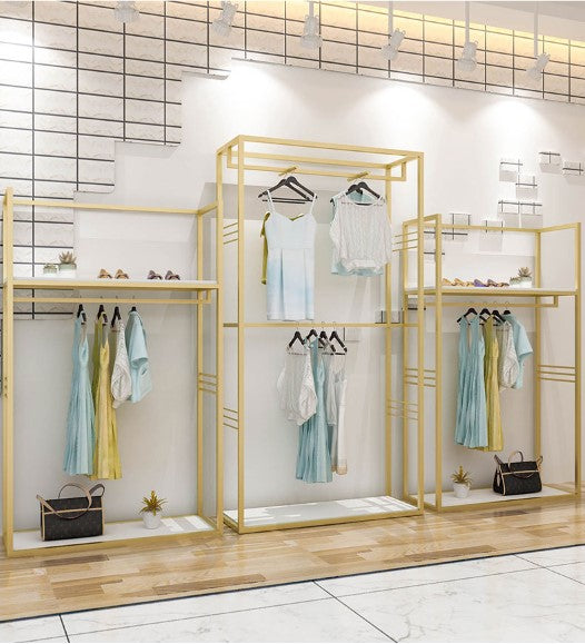 luxury clothing display racks gold retail stands