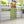 Load image into Gallery viewer, Custom acrylic wall mounted kids shoe racks store display shelf