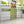 Load image into Gallery viewer, Custom acrylic wall mounted kids shoe racks store display shelf