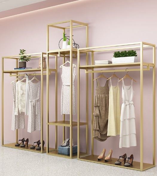 luxury clothing display racks gold retail stands
