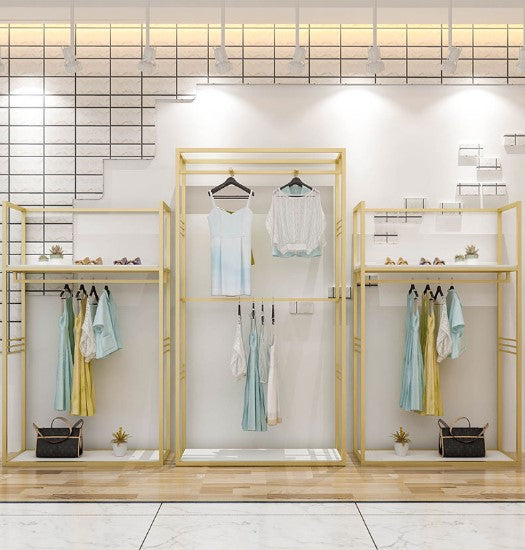 luxury clothing display racks gold retail stands